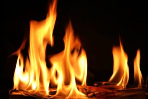 roaring fire in the fireplace 