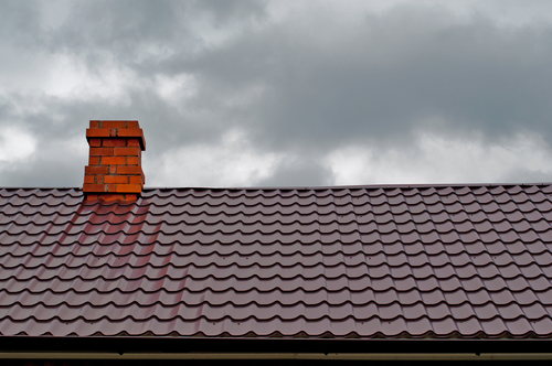 Reasons to Invest in a Chimney Cap or Chase Cover