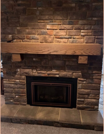 Fireplace makeover- new fireplace with wood mantelpiece